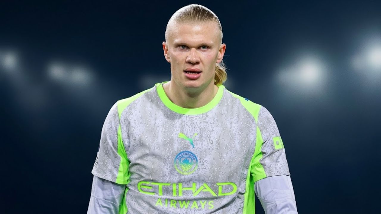 Erling Haaland height shown as he stands at full 6ft 4in frame during a Manchester City match