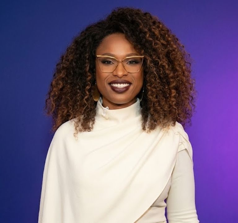 Biography Points – Famous People Biographies & History 15 Jennifer Hudson smiling at a public event, EGOT-winning singer and host of The Jennifer Hudson Show