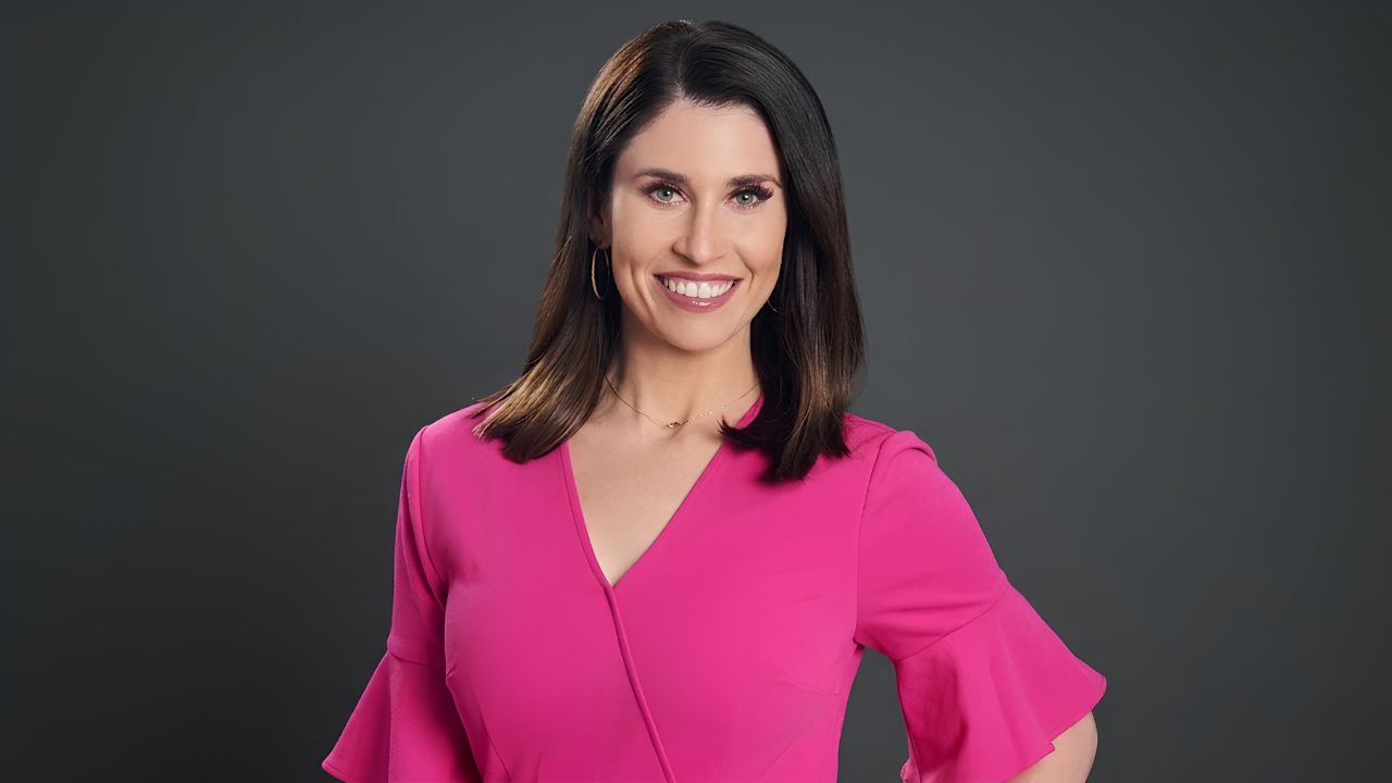 Mary Ours age 35 KDKA-TV meteorologist smiling in studio Pittsburgh