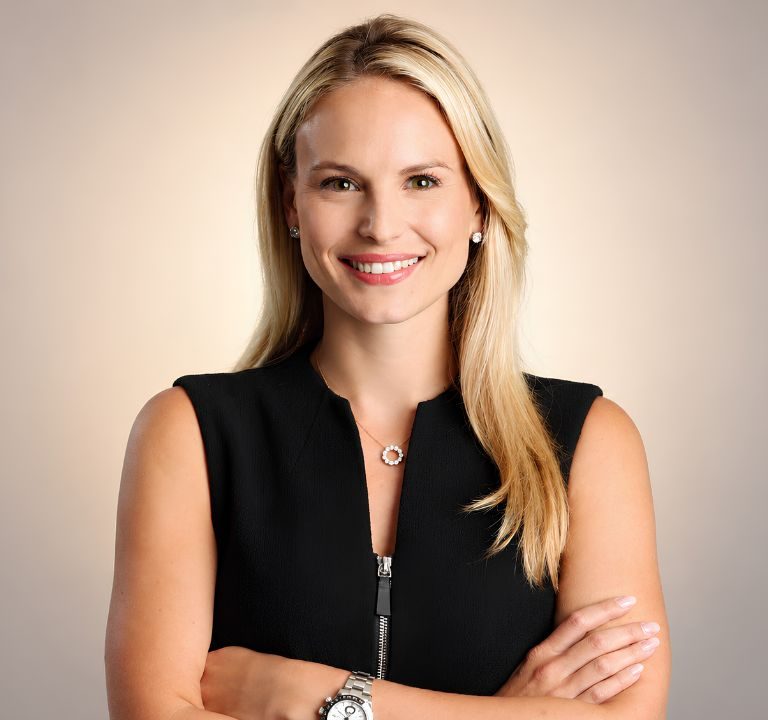Biography Points – Famous People Biographies & History 15 Katie George smiling in ESPN broadcast studio as ACC Network sideline reporter